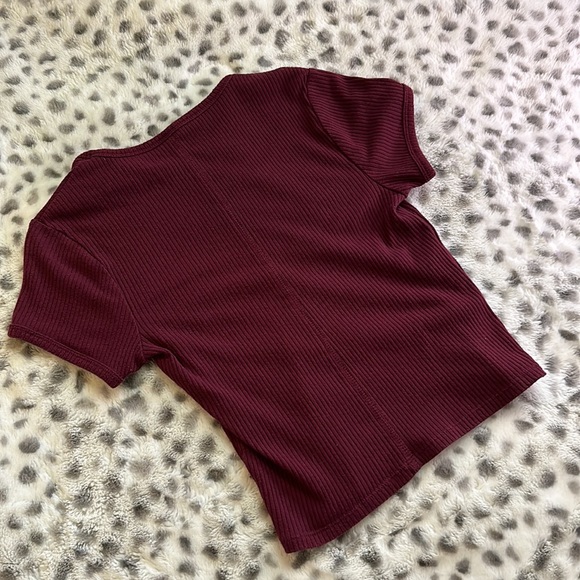 This is a maroon Arizona jean company T-shirt is a lil shorter. - Picture 2 of 2